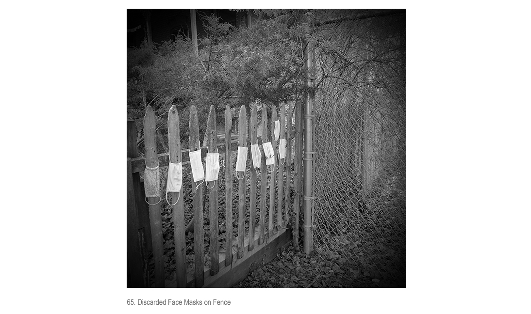 Discarded Face Masks on Fence